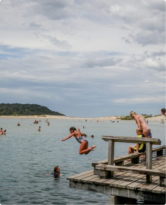 An image of families enjoying one of the many South Shoalhaven beaches